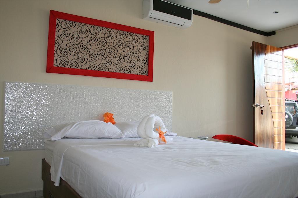 Tuanis Aparthotel Jaco Ruang foto